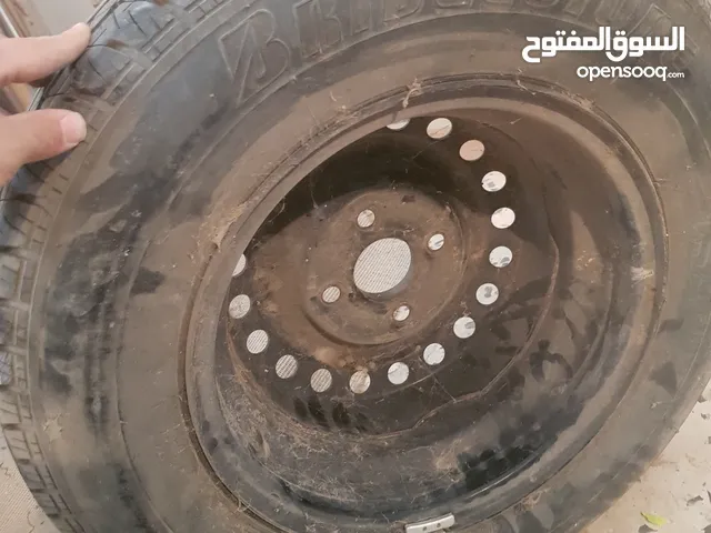 Bridgestone 13 Tyre & Wheel Cover in Tripoli