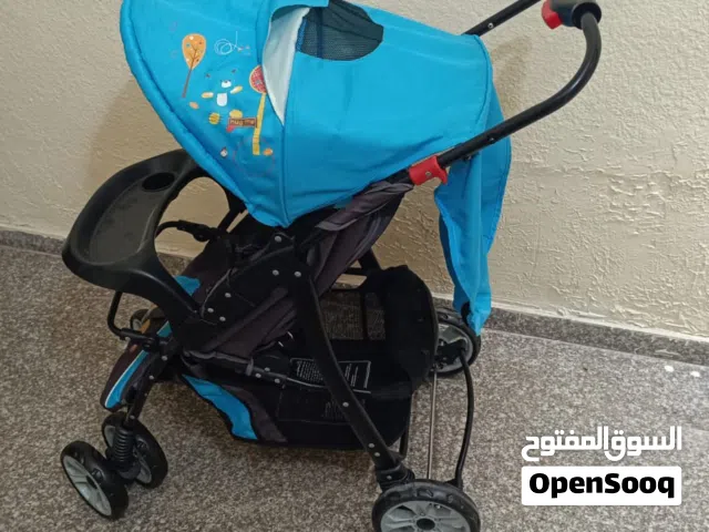 عرباية اطفال نوع جونيورز استخدام خفيف جدا نضيفه وما فيها اشئ