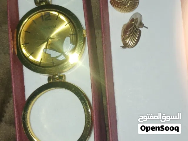 بمناسبه عيد الام  ساعه ستاتي معها حلق  خليجي مطلي ذهب نوع extreem equartz بطاريه