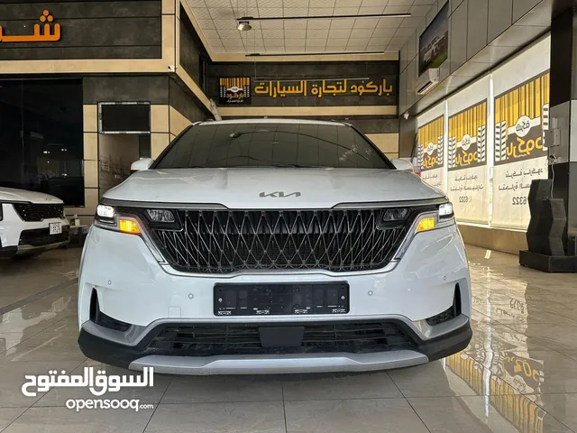 كيا كرنفال 2023 ابيض كلين مرقم بغداد ( شركة باركود )