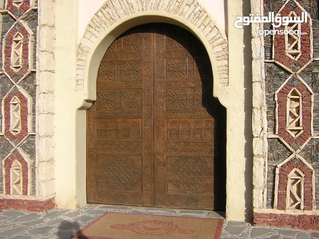 Carved wood gate