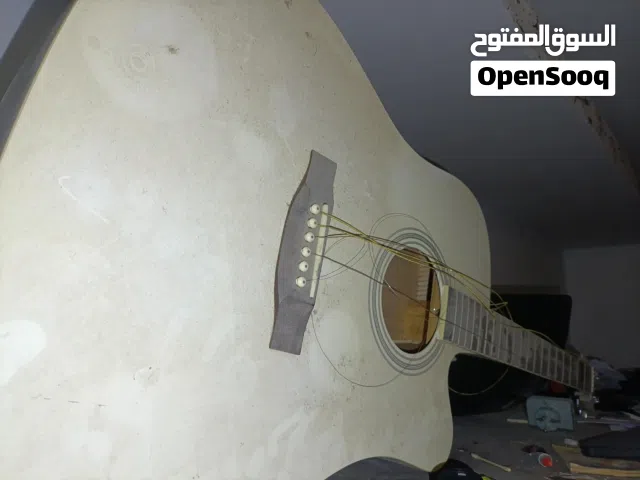 قيثارة و دربوكة