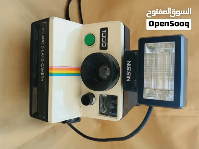 لهواة النوادر كاميرا پولارويد مع الفلاش