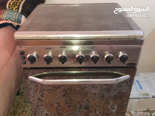 طباخ اوكسترا 4 شعله +(هوز 2 متر ومنظم ) فرن وشوايه شغالين استعمال بحاله ممتازه سعره 25 دينار