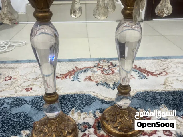 حامل شموع مستعمل بقواعد خشبيه
