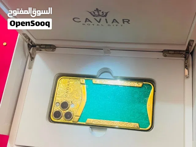ايفون 12 برو ماكس ضهره مطلي دهب عيار 24 ومعه العلبه بتاعته