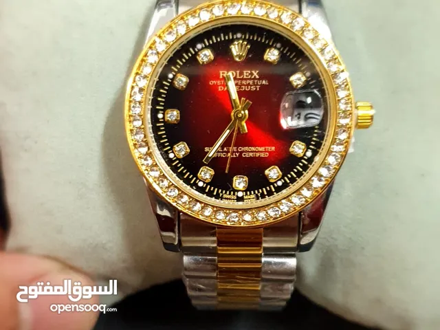 ساعة Rolex كواليتي عالي و لون نادر الأحمر الخمري + كيس و علبة Rolex و قابل للتفاوض