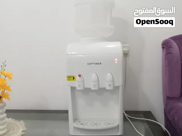 للبيع موزع مياه أبيض من Optima يوضع على الطاولة، ويتميز بتصميم صغير الحجم يناسب المساحات المحدودة.ال