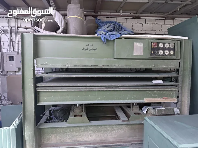 A woodworking machine used for bonding thin sheets of wood,mdf etc