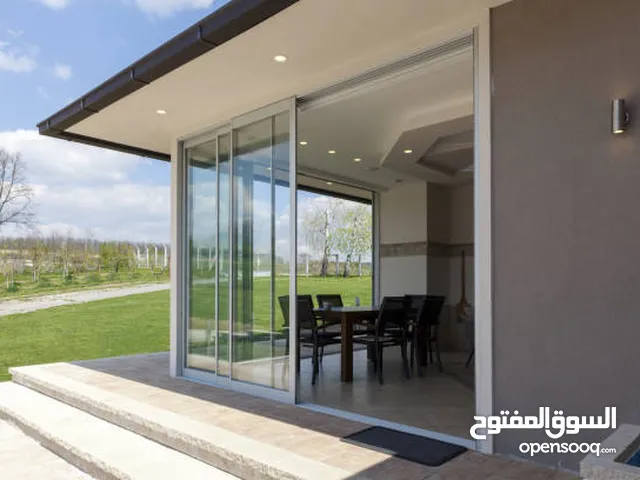 Aluminum and Glass Works