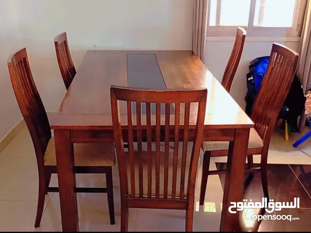 wooding dining table with 5 chaers