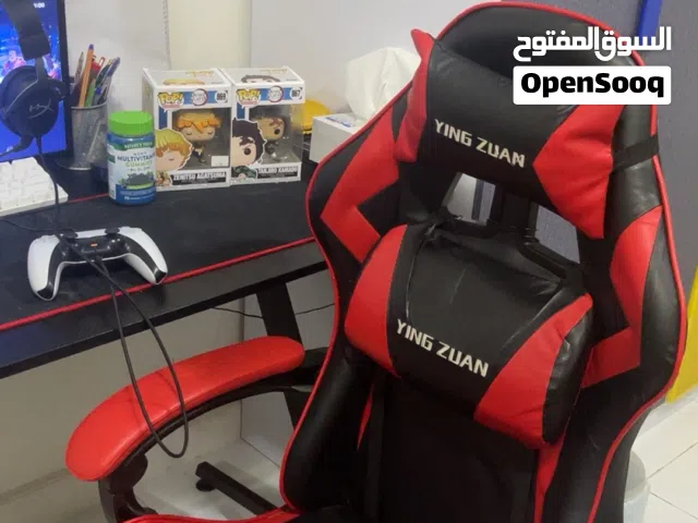 Gaming desk and gaming chair with mousepad and keyboard