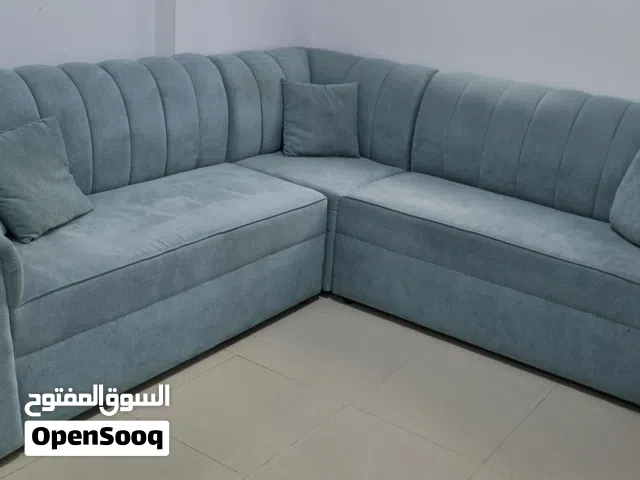 كنب كورنر مع طاولة وسط  لون ازرق