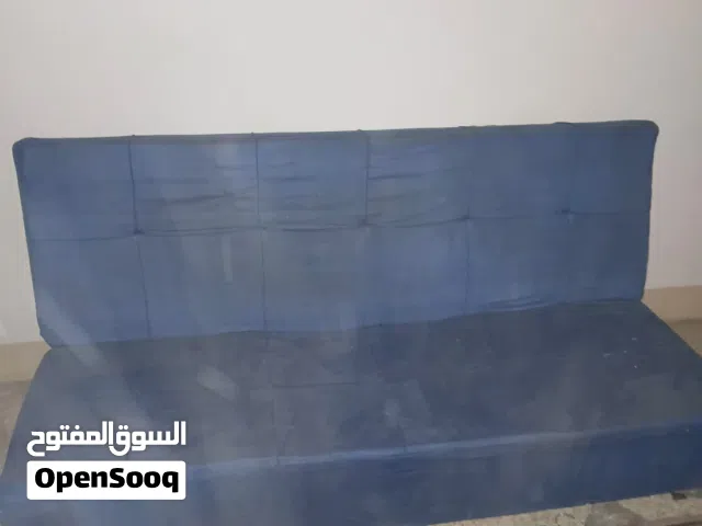 كنبة سرير ازرق داكن بالتوصيل