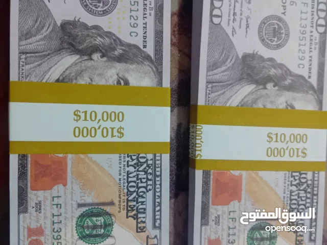دولارات مزيفة للتصوير