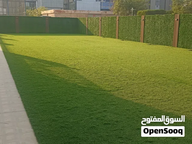 تنسيق حدائق وتركيب الثيل الصناعى والسور التركى وزرع الثيل الطبيعى وتركيب البلاط المتتداخل والكربستون