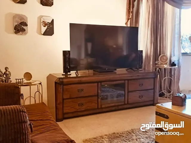 طاولة تلفزيون خشب