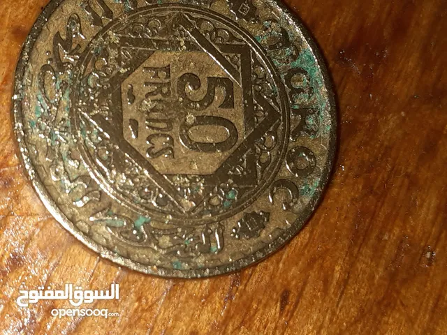 قطعة نقدية معدنية