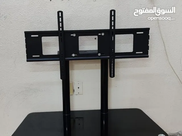 Modern TV stand — elegant, sturdy, and in Sleek black glass TV stand, perfect