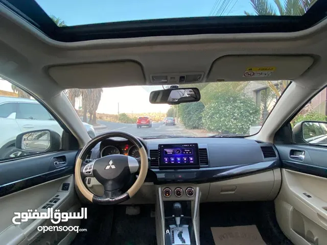 ميتسوبيشي لانسر EX 2017 فل مع الفتحه استخدام شخصي لم تعمل سياحي او تطبيقات فحص كامل