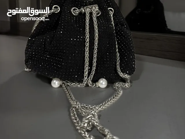 Black bag covered with black crystal