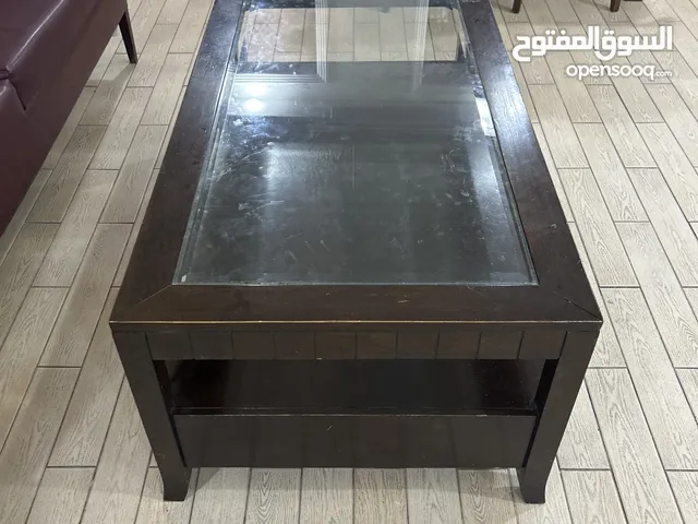 Glass top coffee table wooden