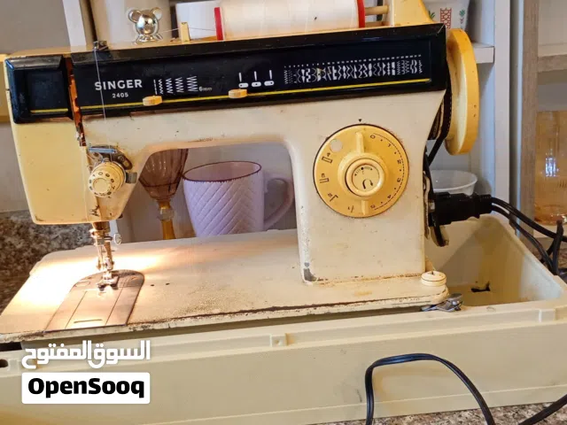 ماكينة خياطة سنجر منزلية للبيع