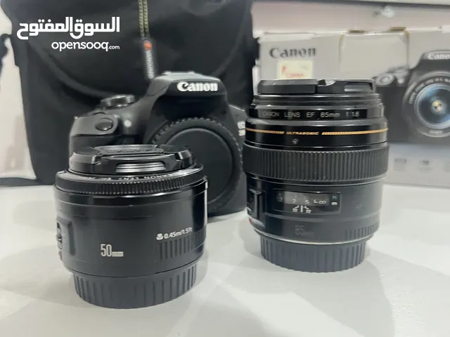 Canon Eos 2000D with 2 prime lens 85mm 1.8 and 50mm 1.8 and charger box everything