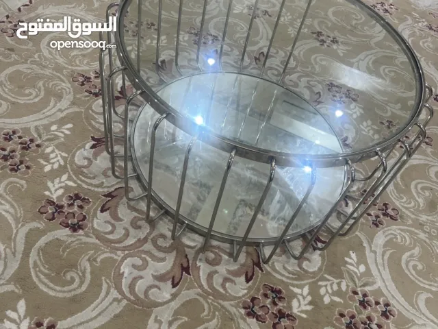طاولة زجاج من دائريه من ميداس
