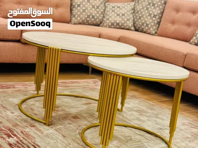 طاولات وسط وطاولات سيرفس وقنصل وجميع الديكورات المعدنية
