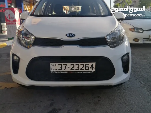 كيا مورننج 2018 جمرك جديد الشكل الجديد لون ابيض ميتالك بحالة الوكاله فحص كامل