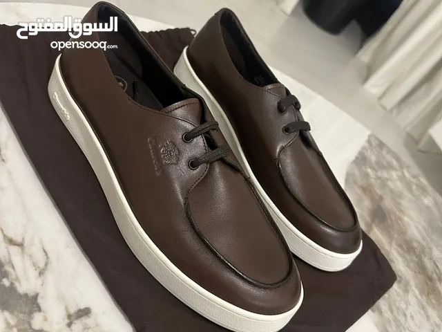 Church’s brown sneaker