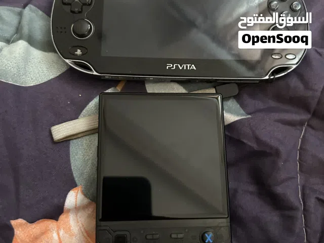 New PlayStation vita black color with charger and R36 ultra retro gaming handheld