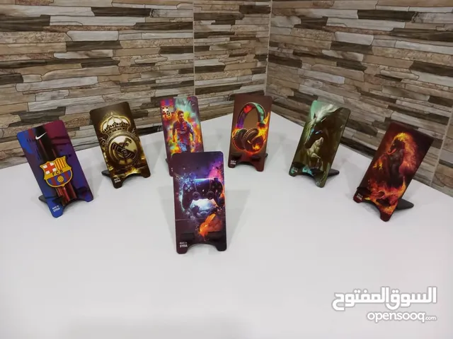 مجموعة من قواعد الجوال سادة ومستعمل جديدة