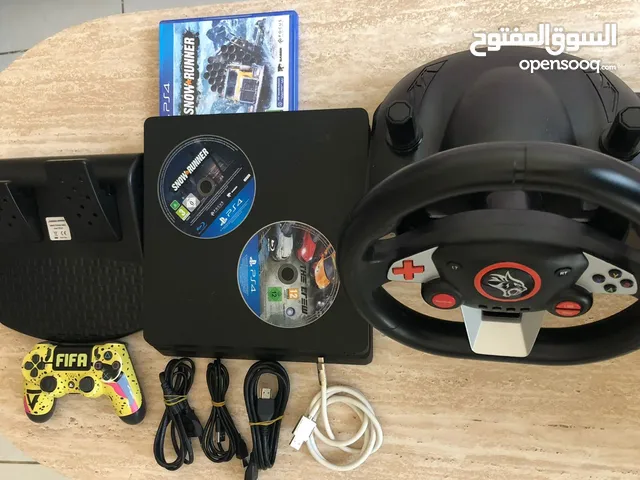 Ps4 Slim 1 tb + Steering wheel set + 1 controller+ 2 game