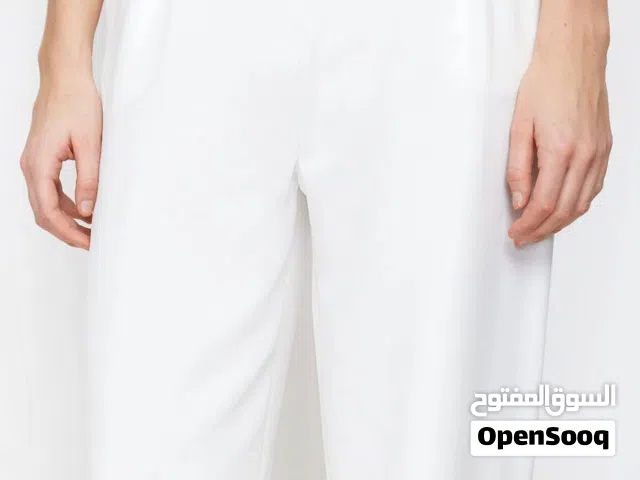 بنطلون أبيض قماش مبطن ماركة موتف  Motef قياس لارج ملبوس على كد القياس