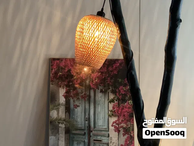 إضاءه ارضية اغصان شجر طبيعي