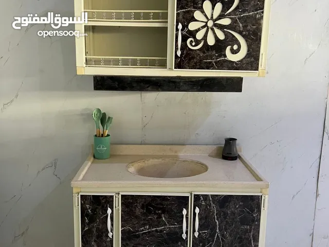 سنك وملحق متر يحتوي على خانة صواني