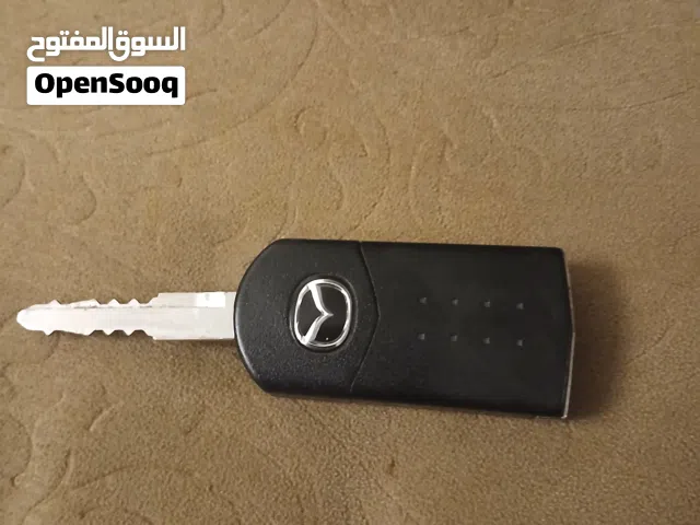 مفتاح مازدا مع شنطة أصلية عاكسة وطفاية حريق
