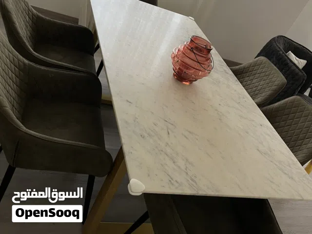 طاولة طعام رخام مع كراسي
