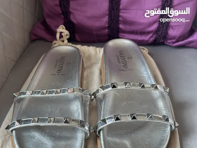 Valentino studded slides silver colour excellent condition with dust bag