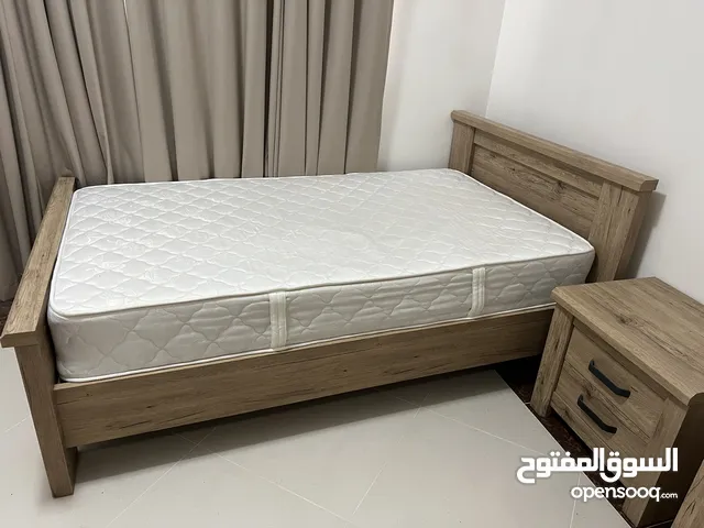 Large single bed with premium mattress