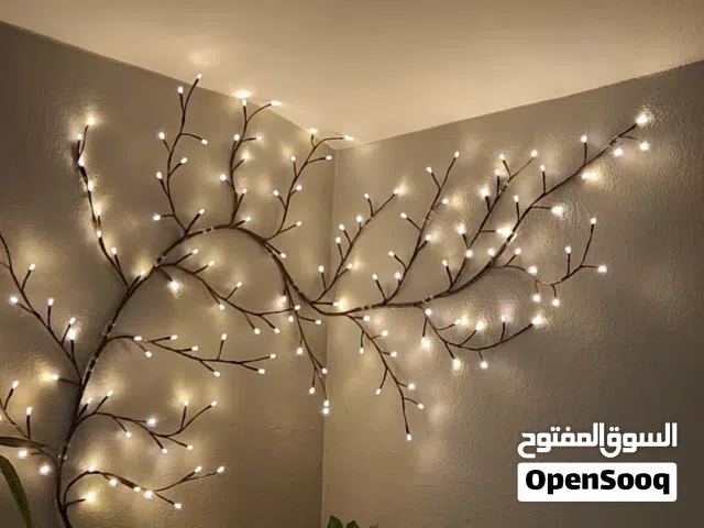 إنارة جدارية بشكل شجرة