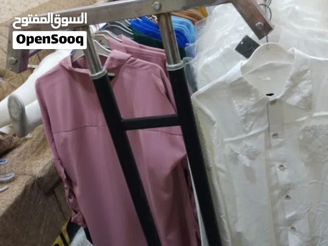 اغراض محل ملابس للبيع