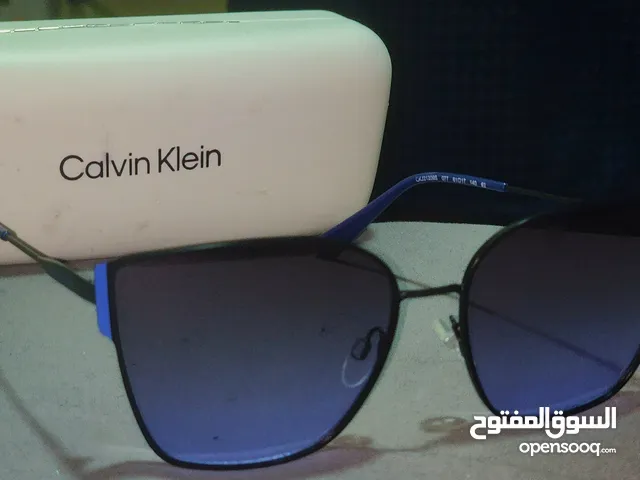 Calvin Klein Women's full rim metal butterfly Sunglasses