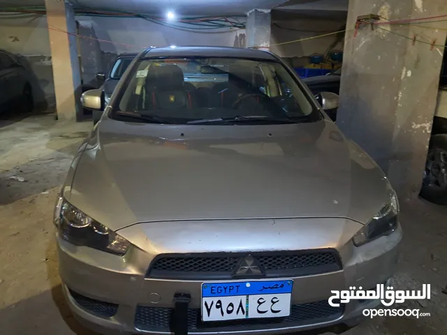 لانسر شارك 2015 بحالة ممتازة ككسر الزيرو فابريكة