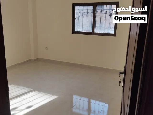 شقة للايجار ,طابق ارضي , حي الرشيد، الرصيفة، خلف مبنى التربية والتعليم