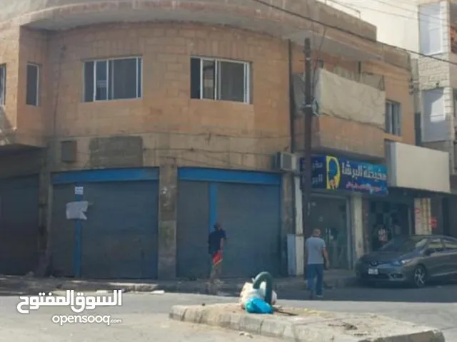 فرصة استثمارية مجمع تجاري وموقع مميز للبيع