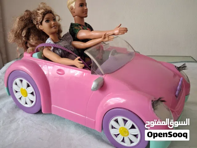 5 barbies + 3 Ken + Barbie car + motorbike