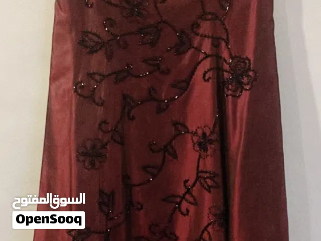 تصفية ملابس أنيقة بحالة ممتازة